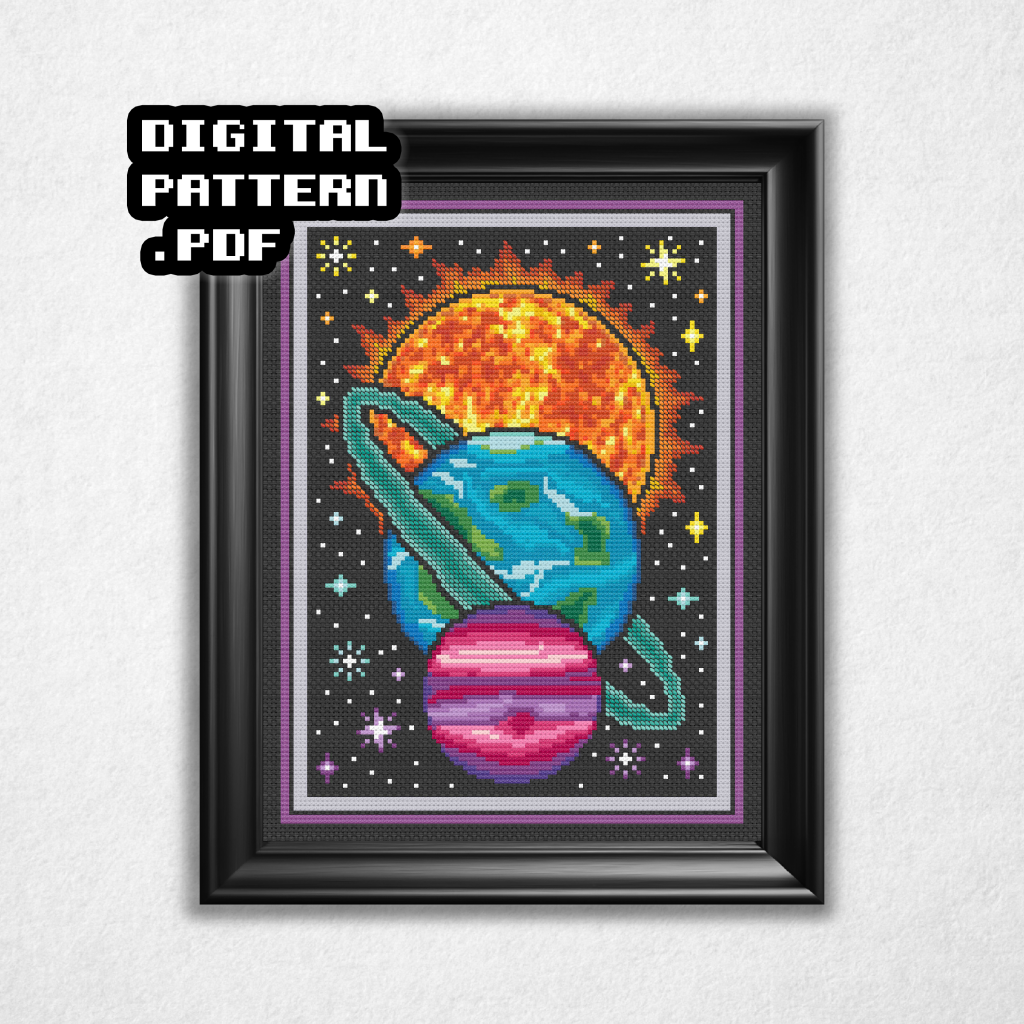 Digital rendering of a cross stitch pattern on black aida cloth in a black frame featuring a sun or star at the top in background in reds oranges and yellows, surrounded in solar flares. In middle ground in the center is a blue and green planet with a diagonal turquoise ring. In the foreground and bottom is a purple plum and pink gaseous planet. Digital Pattern PDF is in bold text in the top left.